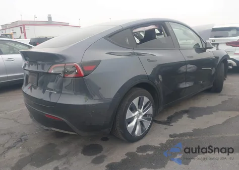 2023 Tesla Model Y Awd/Long Range Dual Motor All-Wheel Drive z USA, uszkodzony, nr VIN 7SAYGDEE8PF853318